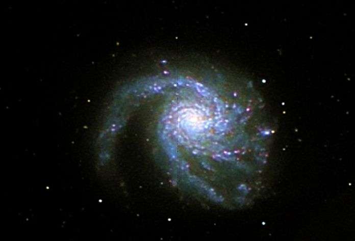 Мессье  99 - спиральная   галактика  в  созвездии  Волосы  Вероники